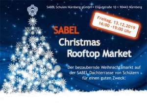 Einladungsplakat für den Christkindlmarkt auf dem Dach der SABEL Schulen Nürnberg im Dezember 2019